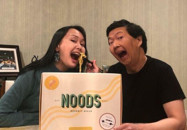 D.K. Jeong son Ken Jeong with his wife having noodles from their favorite kitchen.